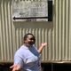 Alabama hairstylist and shop owner DeShanta Black in front of her shop, Humble Beginnings Beauty & Boutique.